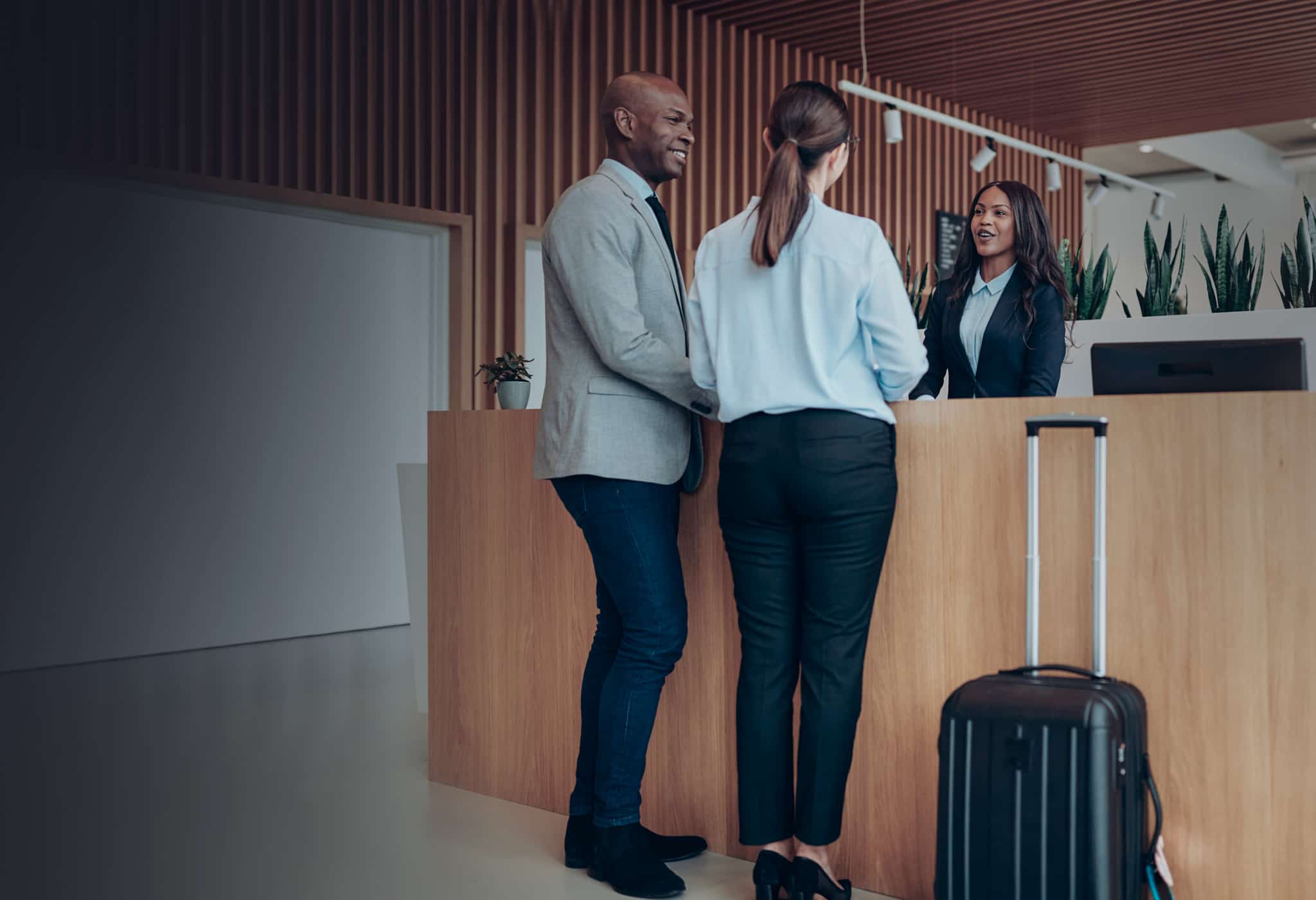 Couple checking in a hotel